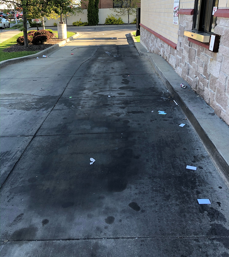 Drive Thru Before commercial pressure washing